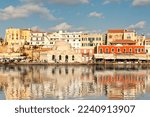 Chania’s Venetian Harbour with the magnificent architecture was built in the 14th century in Crete, Greece