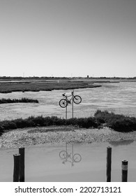 The Venetian Lagoon And Its Reflections In Black And White