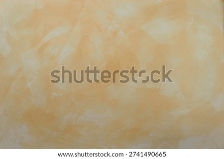 Venetian plaster with marble effect, scuff pattern in warm terracotta tones