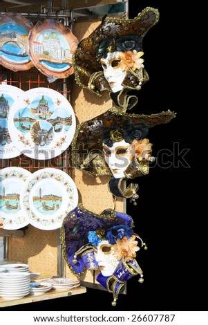 Venetian souvenirs on sale, isolated on black.