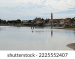 Venetion lagoon and bell tower of church in CAVALLINO Town in Italy near Venice