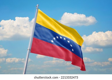 Venezuela Flag And Blue Sky With Clouds.