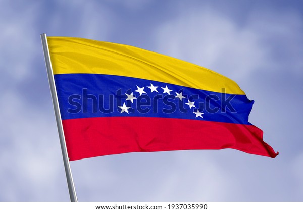 Venezuela flag isolated on sky\
background. close up waving flag of Venezuela. flag symbols of\
Venezuela.
