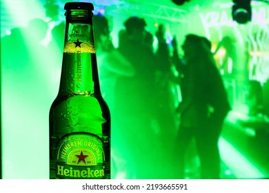 Venezuela Tachira August 23, 2022 Young People Sharing At The Party And Celebrating Drinking Heineken Beer, A Dutch Brewing Company Founded In 1864 By Gerard Adriaan Heineken In Amsterdam