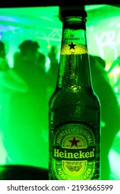 Venezuela Tachira August 23, 2022 Young People Sharing At The Party And Celebrating Drinking Heineken Beer, A Dutch Brewing Company Founded In 1864 By Gerard Adriaan Heineken In Amsterdam