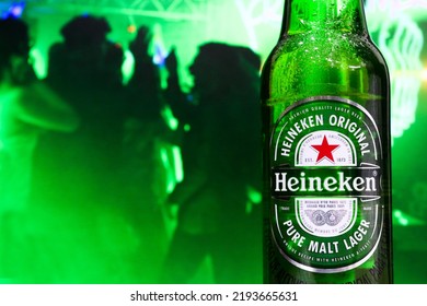 Venezuela Tachira August 23, 2022 Young People Sharing At The Party And Celebrating Drinking Heineken Beer, A Dutch Brewing Company Founded In 1864 By Gerard Adriaan Heineken In Amsterdam