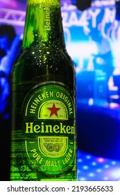 Venezuela Tachira August 23, 2022 Young People Sharing At The Party And Celebrating Drinking Heineken Beer, A Dutch Brewing Company Founded In 1864 By Gerard Adriaan Heineken In Amsterdam