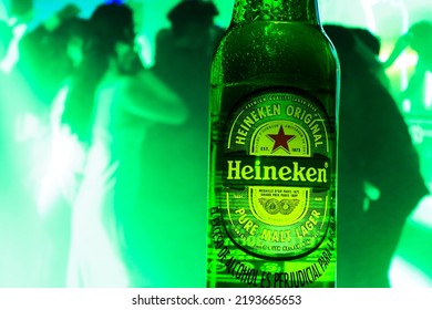 Venezuela Tachira August 23, 2022 Young People Sharing At The Party And Celebrating Drinking Heineken Beer, A Dutch Brewing Company Founded In 1864 By Gerard Adriaan Heineken In Amsterdam