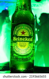 Venezuela Tachira August 23, 2022 Young People Sharing At The Party And Celebrating Drinking Heineken Beer, A Dutch Brewing Company Founded In 1864 By Gerard Adriaan Heineken In Amsterdam