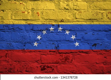 Venezuelan Flag On Brick Wall Background.