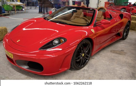 VENHUIZEN, THE NETHERLANDS – MARCH 2 , 2018 :
Red Ferrari F430 italian sports car at an annual auto show on maart 2,2018 in Venhuizen , Holland