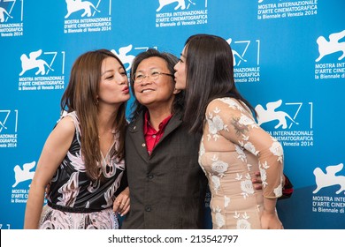 VENICE - AUGUST 28, 2014: 71 Film Festival In Venice - Photocall Of The Film DEAREST. Attending  Producer Director Peter Chan And Actress Hao Lei And Zhao Wei