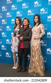 VENICE - AUGUST 28, 2014:71 Film Festival In Venice - Photocall Of The Film DEAREST. Attending  Producer Director Peter Chan And Actress Hao Lei And Zhao Wei