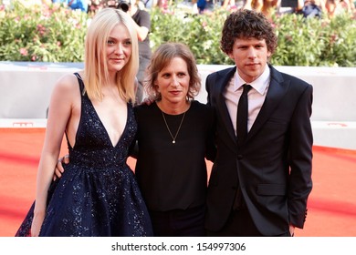 VENICE - AUGUST 31:Dakota Fanning, Kelly Reichardt, Jesse Eisenberg at 'Night Moves' premiere at the 70th Venice Film Festival on August 31, 2013 in Venice.