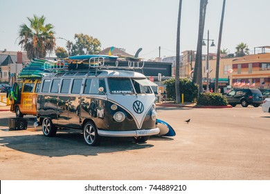 Venice Beach, Los Angeles USA - March 15, 2015: A Classic Volkswagen Van Full With Surf Boards Parked At The Venice Beach In Los Angeles. 