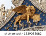 Venice, close up of the golden winged lion of St Mark, symbol of the evangelist and the Venetian Republic. Basilica and Cathedral of San Marco, UNESCO world heritage site, Veneto, Italy, Europe
