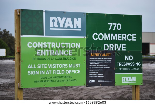 Venice, FL / USA - February 21, 2020: Construction\
Entrance Sign at the Future Site of a Southwest Florida Amazon\
Fulfillment Center