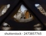 Venice, Italy; 02-17-2024: views from the cracks and gaps of the Bridge of Sighs, towards the exterior, of the Doge