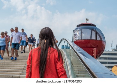 Venice, Italy - August 24, 2018: Woman Walking Up The Stairs Of The Constitution Bridge In The City Of Venice, Italy