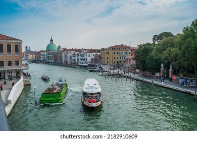 Venice, Italy - August 24, 2018: Vessels On The Grand Canal Seen From The Constitution Bridge In The City Of Venice, Italy