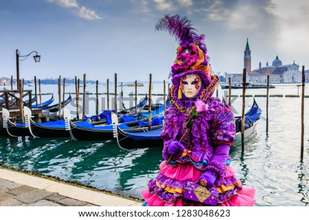 Venice, Italy. Carnival of Venice, beautiful mask at St. Mark`s Square.