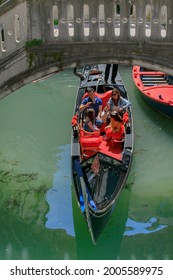 Venice, Italy, Europe - May, 8th, 2021 -  Boat Ride By Typical Gondola