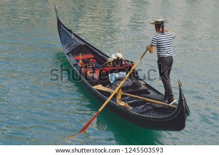 Venice, Italy - Gondola and gondolier
