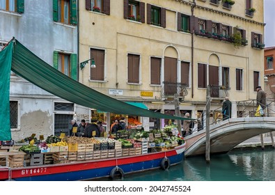 VENICE, ITALY - JANUARY 28, 2010 : Floating Food Market On The Boat In Venice, Italy.