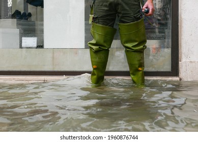 VENICE, ITALY - Nov 13, 2019: After The Great Flood, You Could Only Walk Through Venice In High Rubber Boots  The Water Was Up Tothe Knees That Morning 