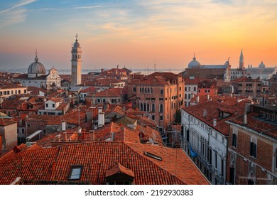 Venice; Italy rooftop skyline towards San Giorgio dei Greci and its leaning bell tower.