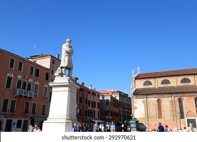 VENICE, ITALY - SEPTEMBER 2014 : People Hang Out At Statue Of Nicolo Tommaseo Monument In Venice, Italy On September 14, 2014. Nicolo Tommaseo Was A Linguist, Journalist, Essayist, Italian Irredentism