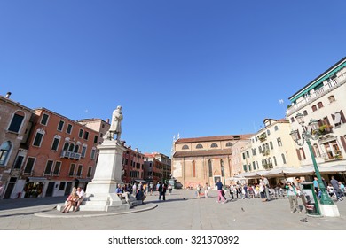 VENICE, ITALY - SEPTEMBER 2014 : People At Statue Of Nicolo Tommaseo Monument In Venice, Italy On September 14, 2014. Nicolo Tommaseo Was A Linguist, Journalist, Essayist, And Italian Irredentism