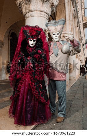 Venice mask at St. Mark's Square near the Doge's Palace and the Grand Canal