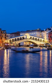 Venice Rialto Bridge Over Canal Grande With Gondola Travel Traveling Holidays Vacation Town City Portrait Format At Night In Italy