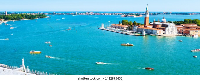 Venice skyline, Italy. Scenic panorama of Venice with San Giorgio Maggiore island. Landscape of Venice city and sea. Nice marine view of Venice from above in summer. Romantic water trip in Venezia.