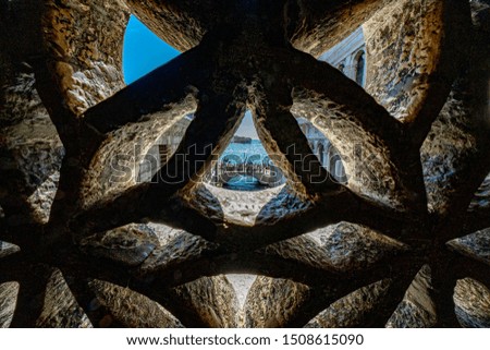 Similar – Schmales Fenster in der Steinmauer mit Blick auf das Pariser Stadtbild