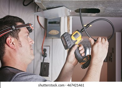 ventilation cleaner man at work with tool