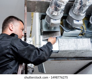 Ventilation Cleaning. Specialist At Work. Repair Ventilation System (HVAC). Industrial Background