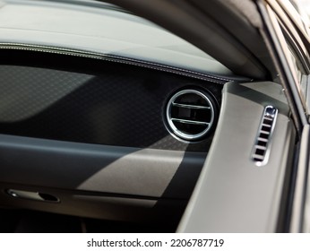 Ventilation In A Modern Car With Black And White Leather And Wood Trim