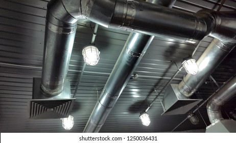 Ventilation. Ventilation pipes with grille. Ventilation system. Photo ventilation pipe. Industrial background