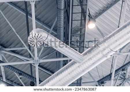 Ventilation pipes hvac duct tube hanging from ceiling store inside for conditioner air