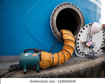 Ventilation System In Chemical Storage Tanks That Has To Wash The Tank, Must Use Chemical Protection Mask Measure Air In Confined Space.