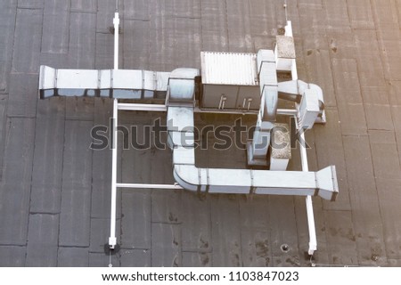 Ventilation system on the roof of the house, metal ventilation shafts