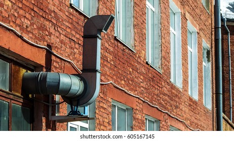 Ventilation system on the wall of old brick building