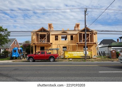 Ventnor, New Jersey - August,2022: A New House Framed Out With Wood By An Asphalt Street