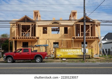 Ventnor, New Jersey - August,2022: A New House Framed Out With Wood By An Asphalt Street