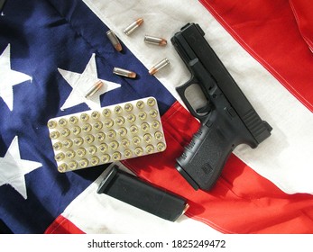 Ventnor, New Jersey/USA-9/2020:A Semi Automatic Firearm And Ammunition On An American Flag.