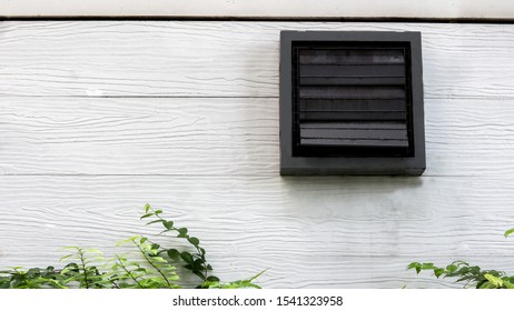Vents at the white wooden building