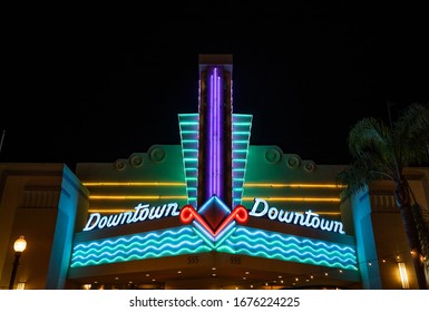 Ventura, California / USA - September 11 2019: Neon "Downtown" sign for Century Theater in Ventura lit up at night downtown on Main St.