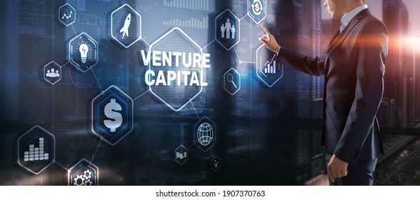 Venture capital. Investor capital. Businessman pressing virtual screen inscription. - Shutterstock ID 1907370763